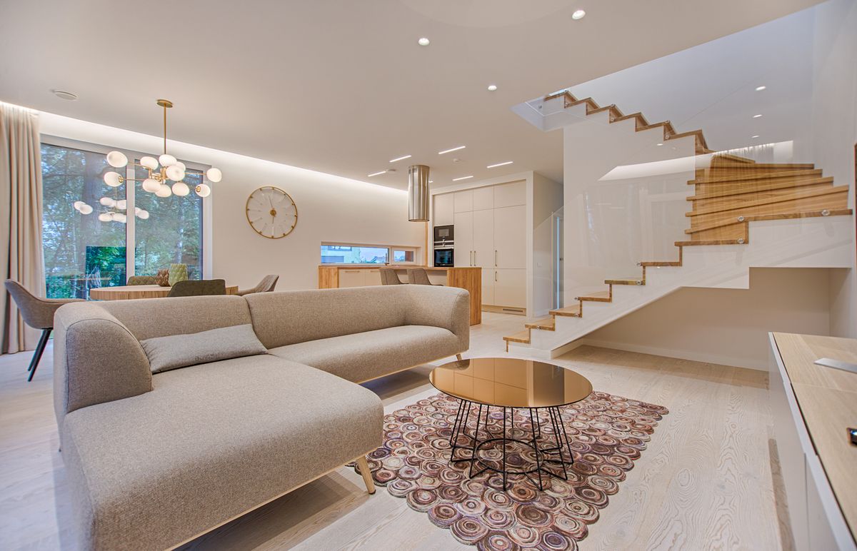 Premium hotel room with warm neutral tones and soft natural light